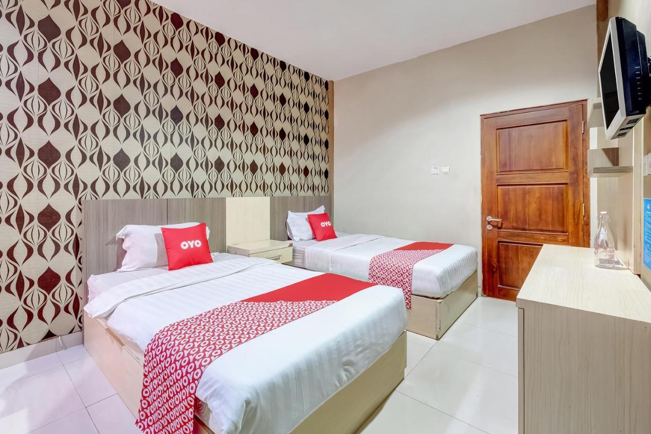 Oyo Flagship 3726 Tembok Batu Residence Tugu Buitenkant foto