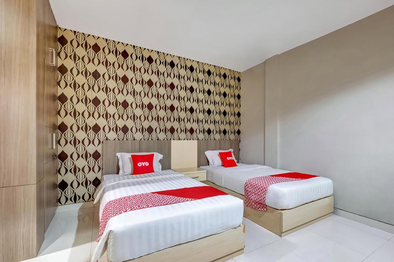 Oyo Flagship 3726 Tembok Batu Residence Tugu Buitenkant foto