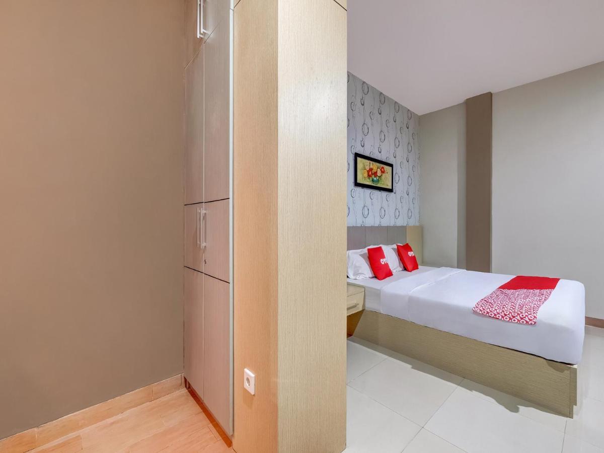 Oyo Flagship 3726 Tembok Batu Residence Tugu Buitenkant foto