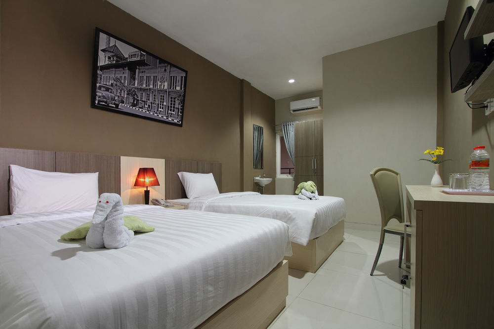 Oyo Flagship 3726 Tembok Batu Residence Tugu Buitenkant foto