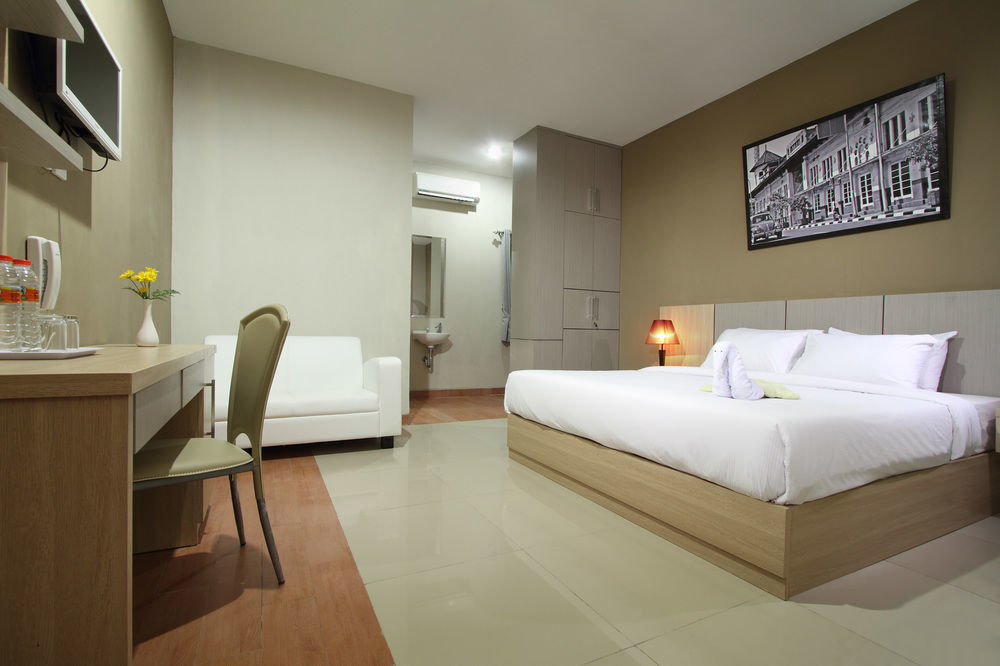 Oyo Flagship 3726 Tembok Batu Residence Tugu Buitenkant foto
